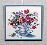Вышивка «Цветы в чашке» 29,5х32,0
(рамка деревянная, стекло антибликовое, задник, установка работы в раму, натяжка вышивки)
